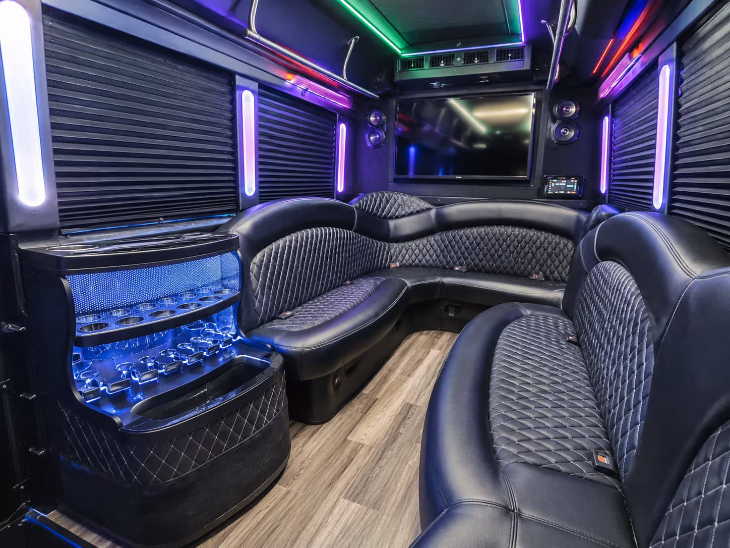 Group beside a Mercedes Sprinter limo in Kansas City